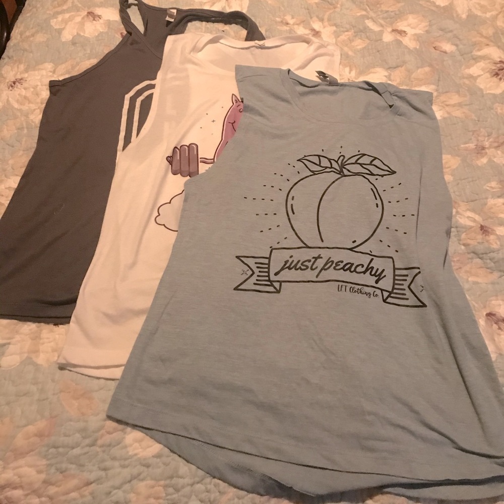 Bundle of 3 workout tanks. 2 muscle and 1 racer